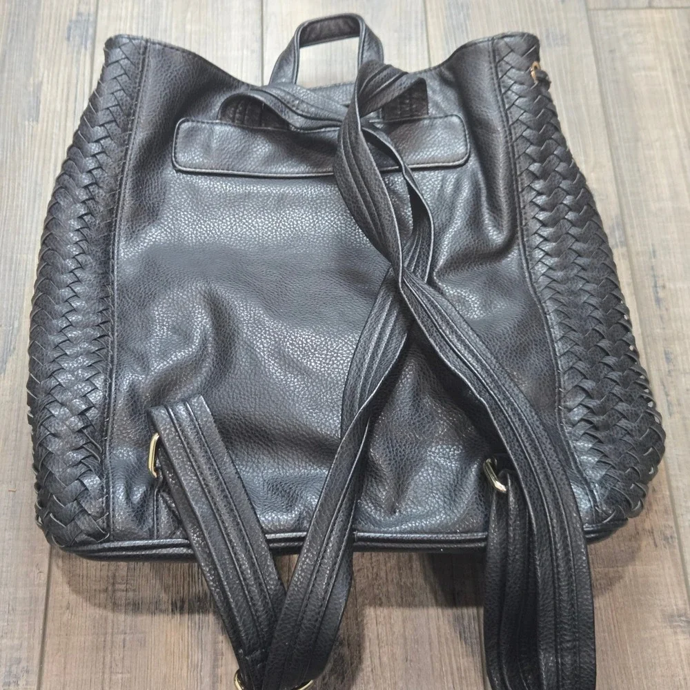 Anthropologie Deux Lux Black Woven Faux Leather Backpack Drawstring Flap Closure